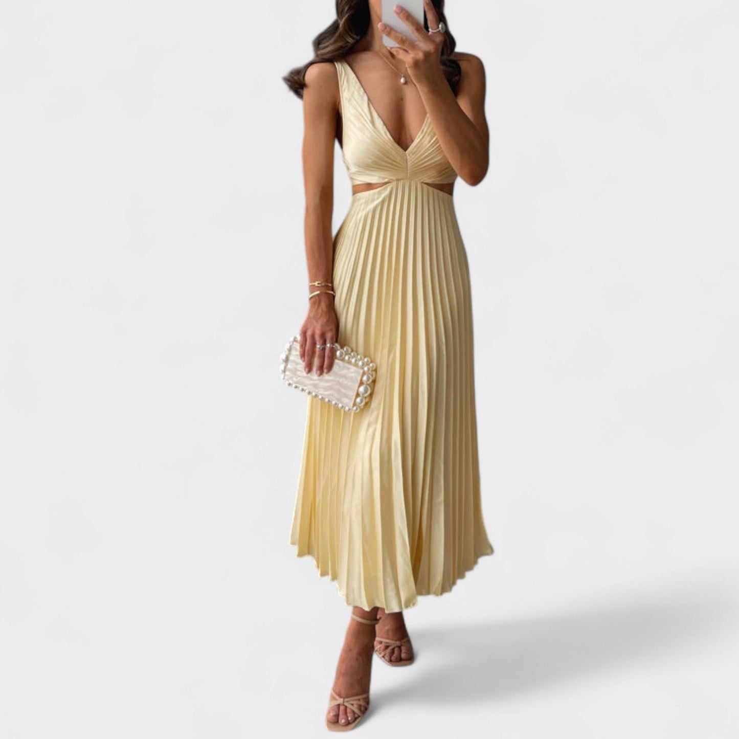 Eva – Vestido Plisado Midi