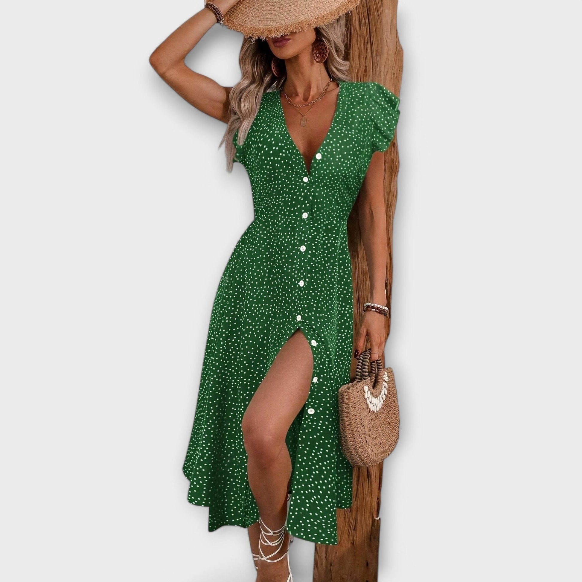 Elegante vestido midi de lunares Elegante vestido midi de lunares A minha loja