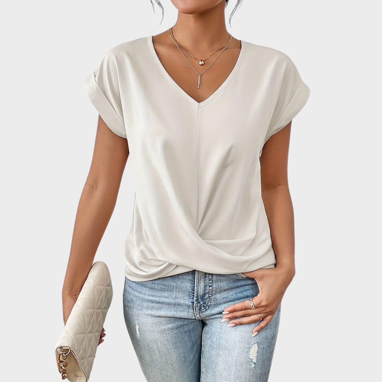 Eloise | Blusa con escote en V y detalle de nudo Eloise | Blusa con escote en V y detalle de nudo Rita Blanco S