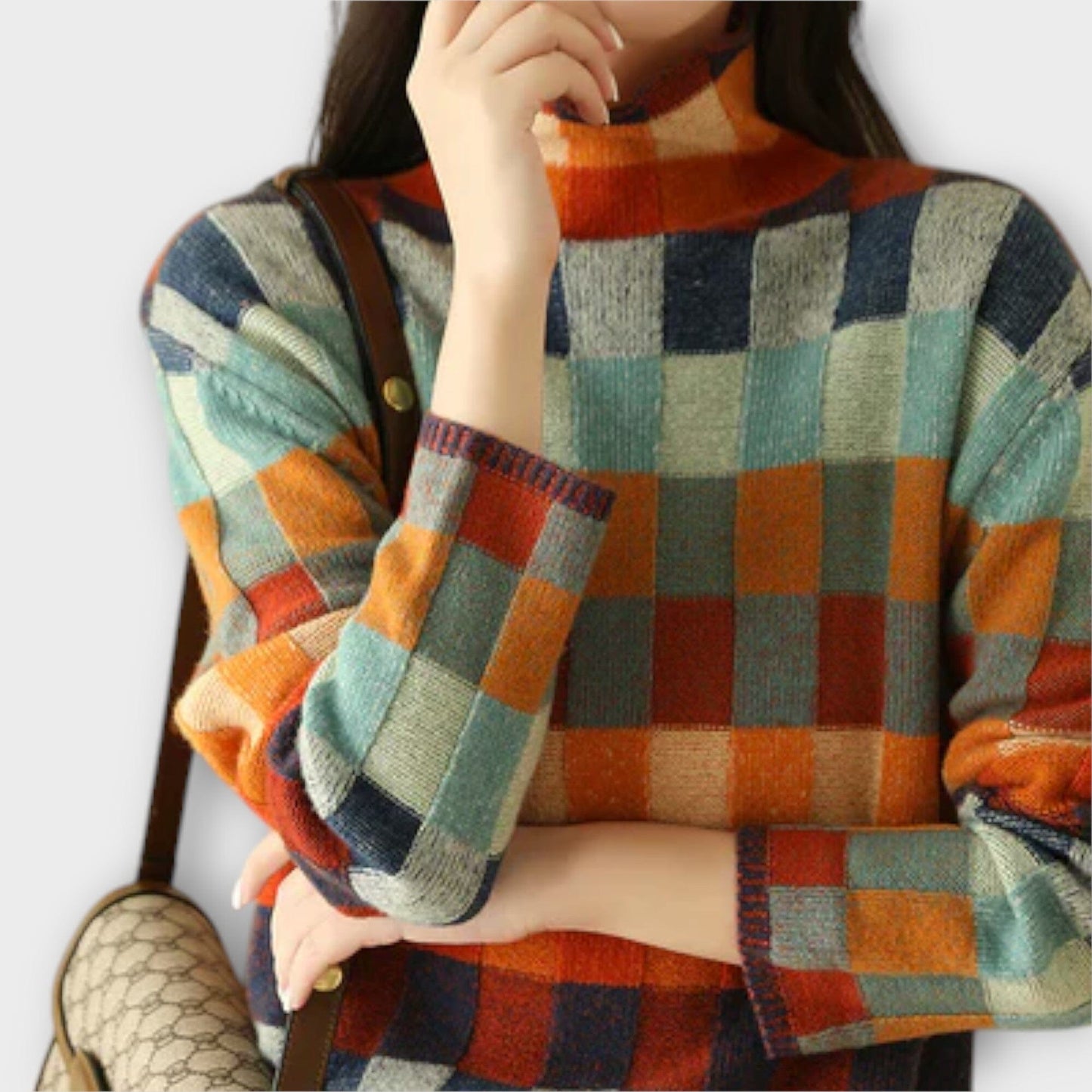 Erika – Suéter de Cuello Alto con Diseño Patchwork Erika – Suéter de Cuello Alto con Diseño Patchwork A minha loja