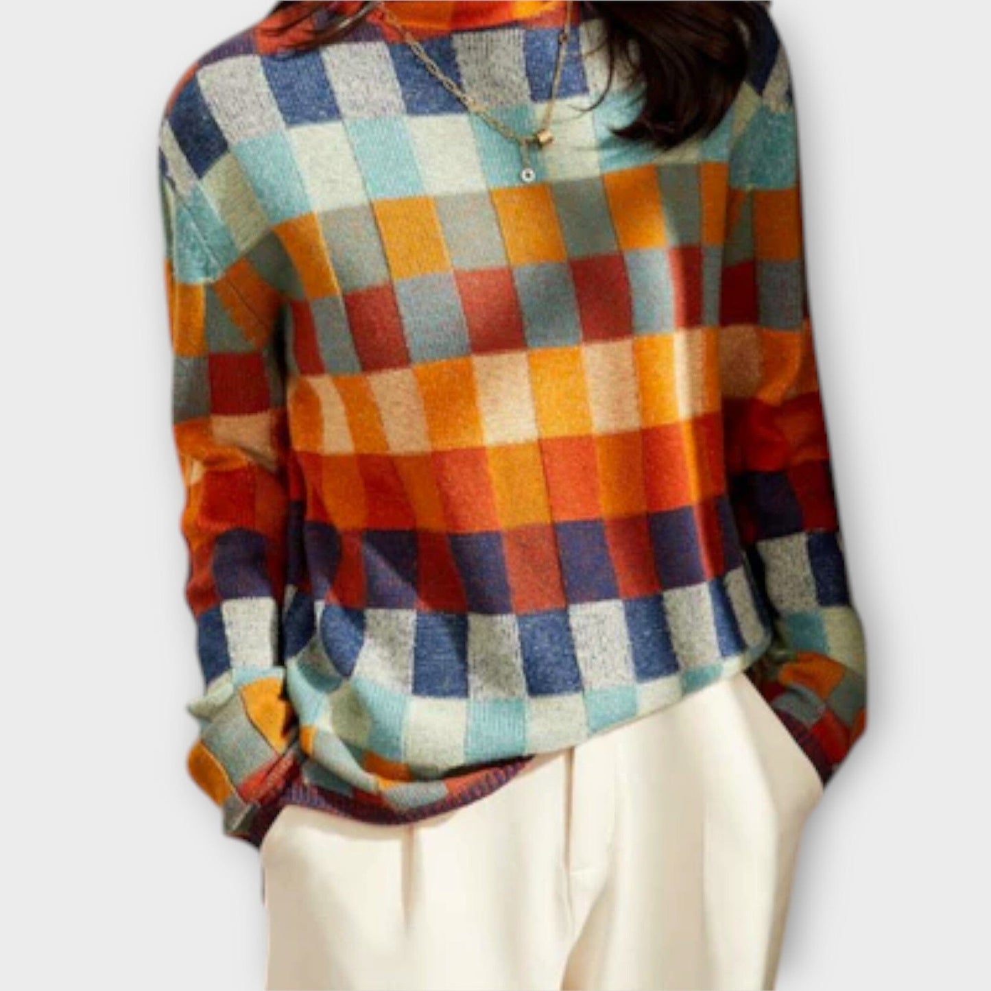 Erika – Suéter de Cuello Alto con Diseño Patchwork Erika – Suéter de Cuello Alto con Diseño Patchwork A minha loja