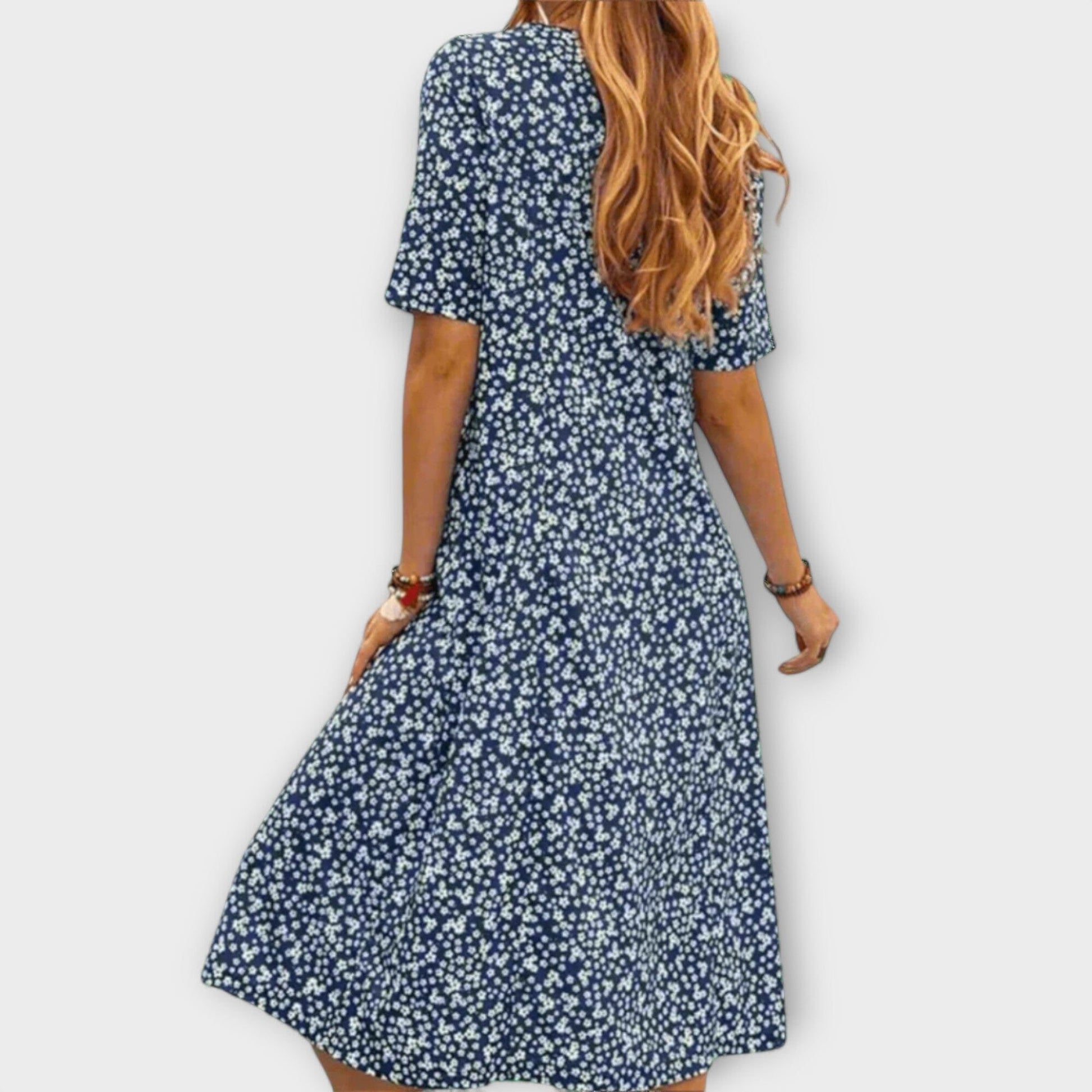 Paula – Elegante vestido floral de tejido premium Paula – Elegante vestido floral de tejido premium A minha loja