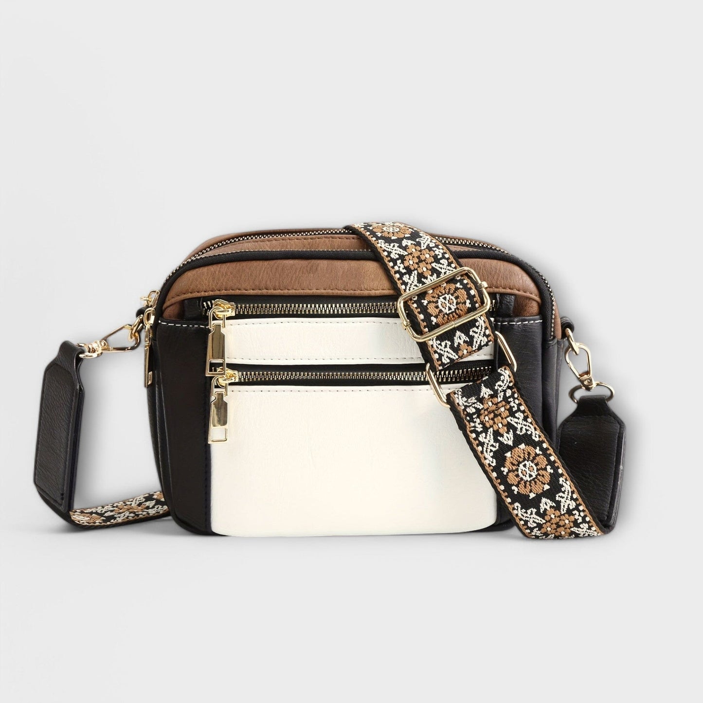 Rita. – Bolso bandolera de cuero vegano Rita. – Bolso bandolera de cuero vegano Rita Weiß & Schwarz