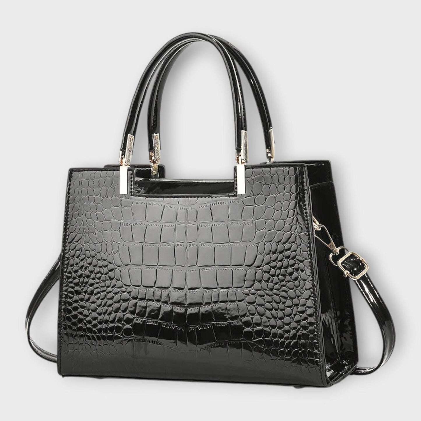 Rita. – Bolso de mano efecto cocodrilo brillante Rita. – Bolso de mano efecto cocodrilo brillante Rita