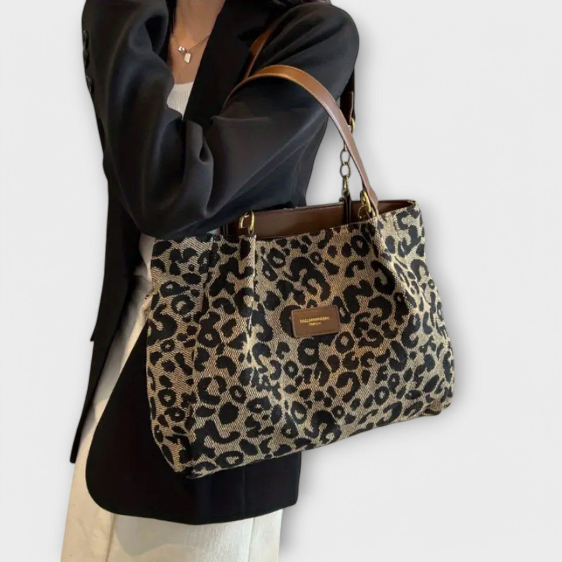 Rita. – Bolso tote de lona con estampado de leopardo Rita. – Bolso tote de lona con estampado de leopardo Rita