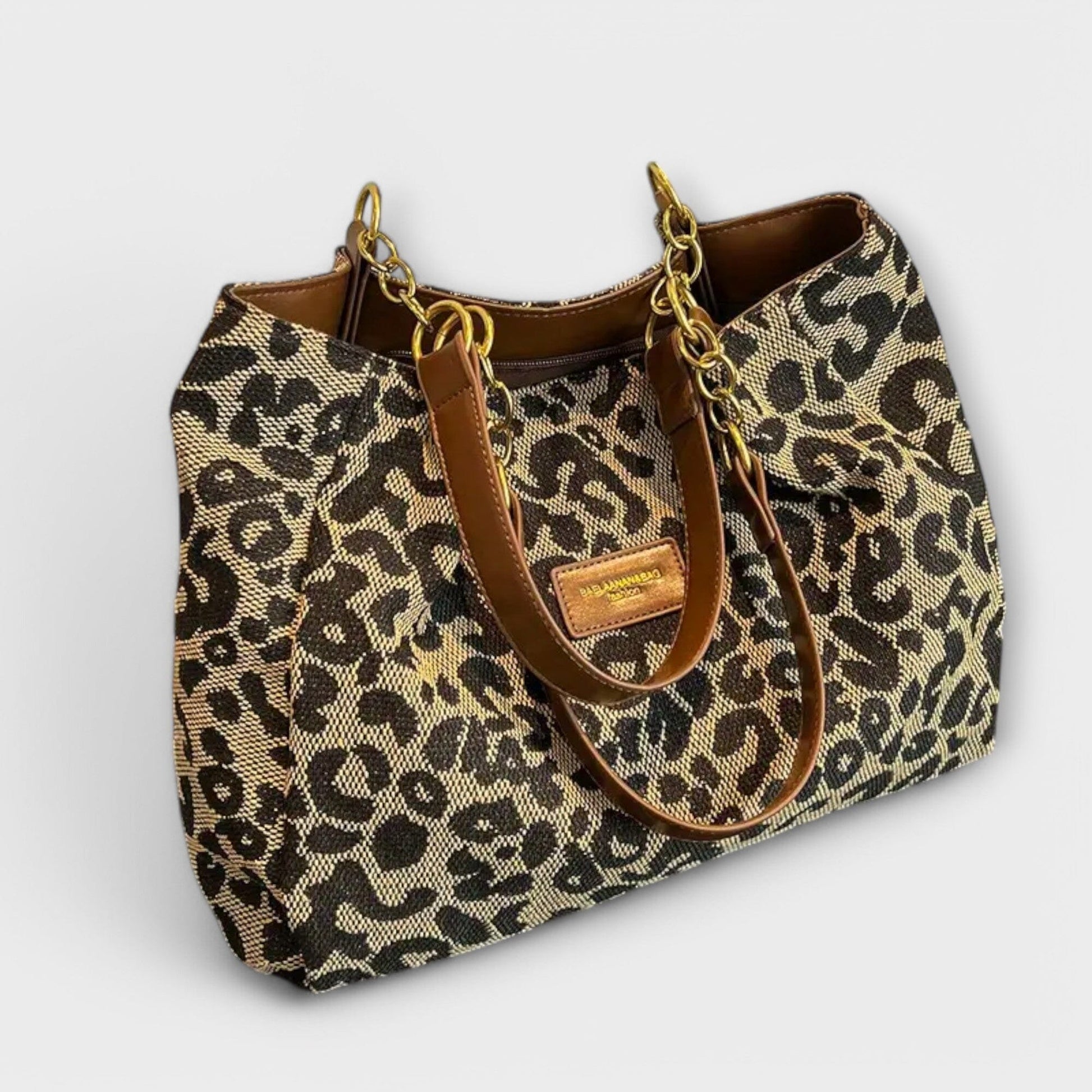 Rita. – Bolso tote de lona con estampado de leopardo Rita. – Bolso tote de lona con estampado de leopardo Rita