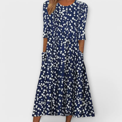 Paula – Elegante vestido floral de tejido premium Paula – Elegante vestido floral de tejido premium A minha loja Azul S 