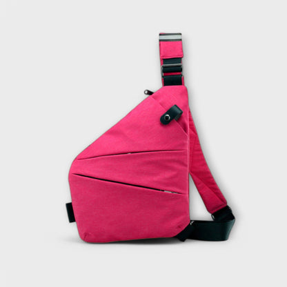 Rita. – Bolso bandolera antirrobo Rita. – Bolso bandolera antirrobo Rita Fuchsia Rechtshänder 