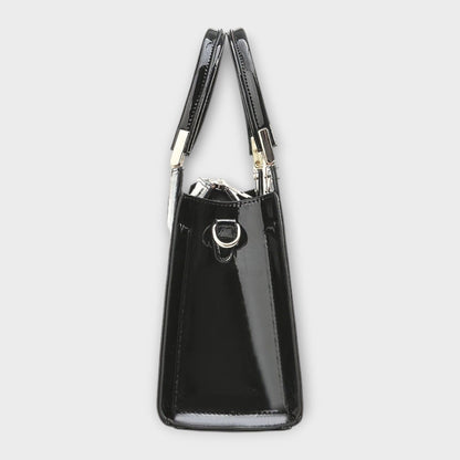 Rita. – Bolso de mano efecto cocodrilo brillante Rita. – Bolso de mano efecto cocodrilo brillante Rita 
