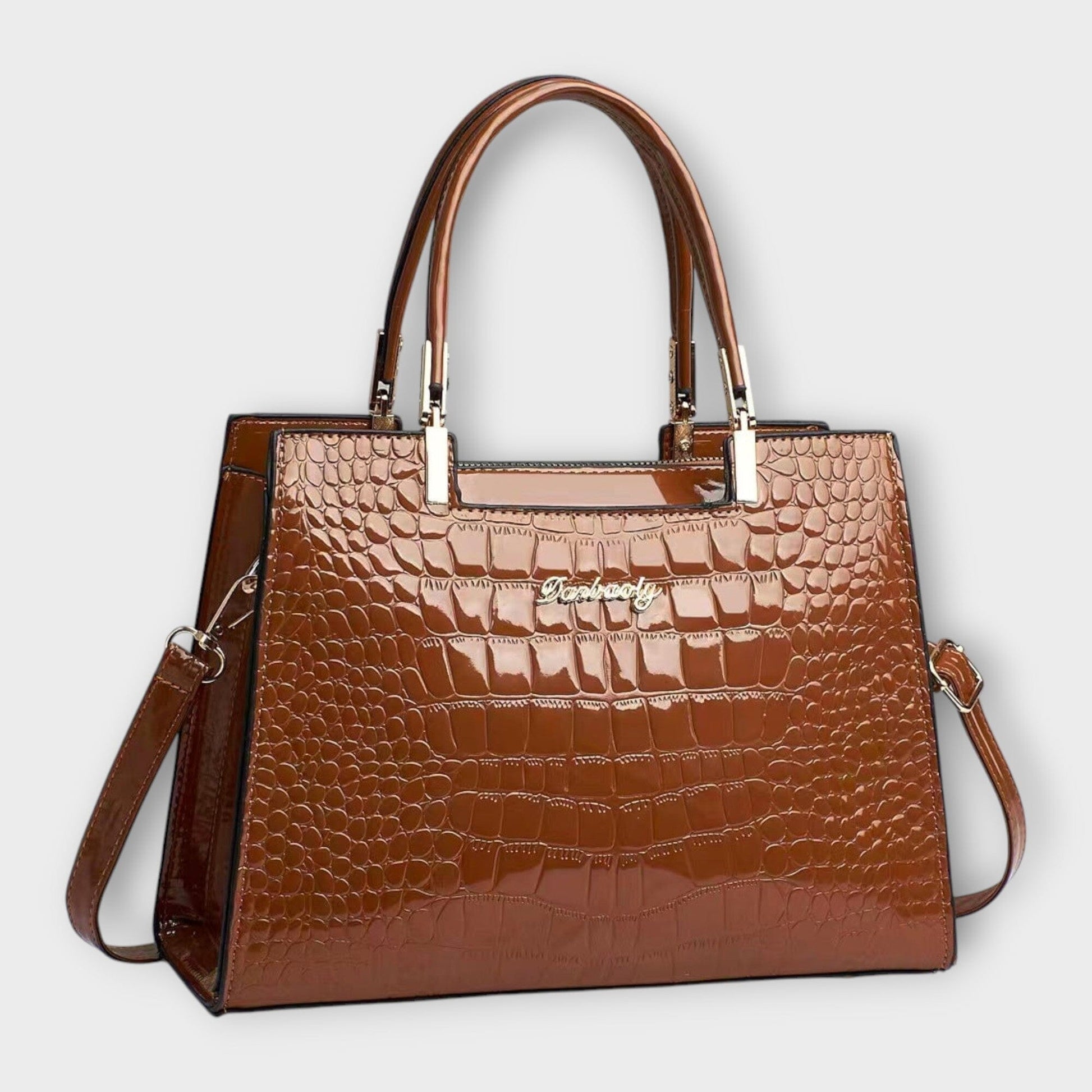 Rita. – Bolso de mano efecto cocodrilo brillante Rita. – Bolso de mano efecto cocodrilo brillante Rita Braun 