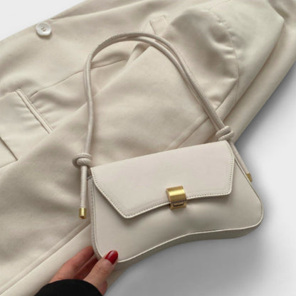 Rita. – Bolso vintage con solapa Rita. – Bolso vintage con solapa Rita Beige 
